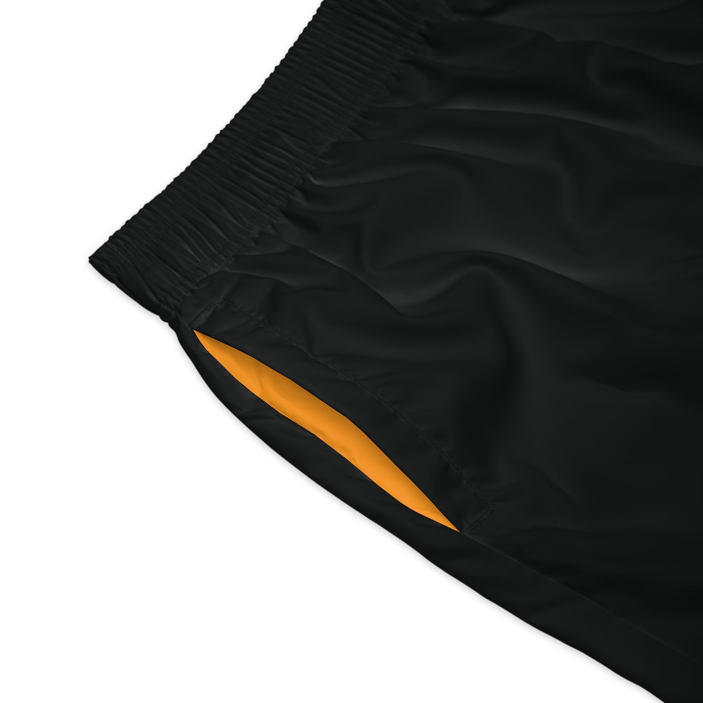 Black & orange sports shorts close up